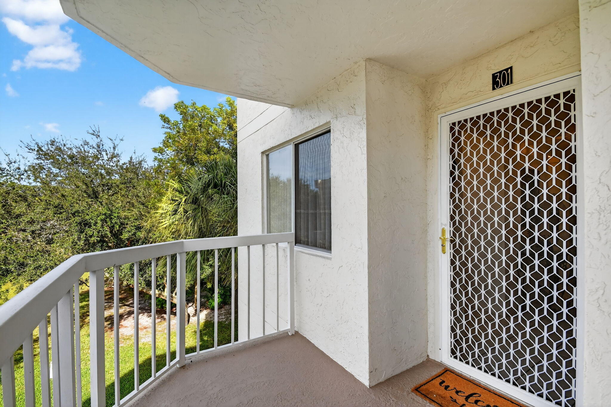 3146 Via Poinciana, Unit 301 Lake Worth, FL 33467 - Photo 2 of 23 a view of a balcony