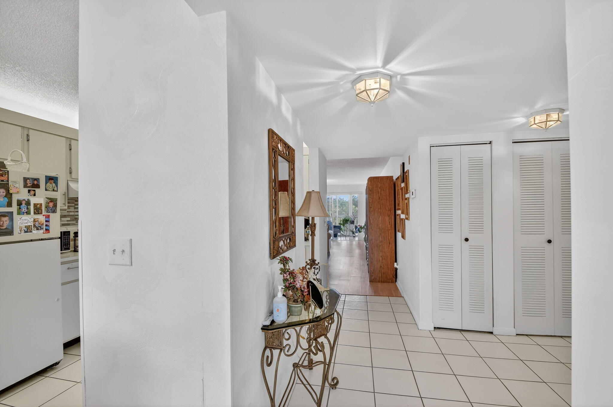 3146 Via Poinciana, Unit 301 Lake Worth, FL 33467 - Photo 3 of 23 a view of a room with gym equipment