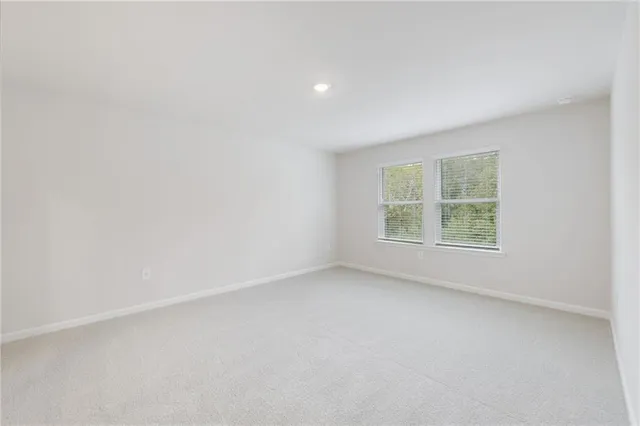 a bed room with a bed and a couch