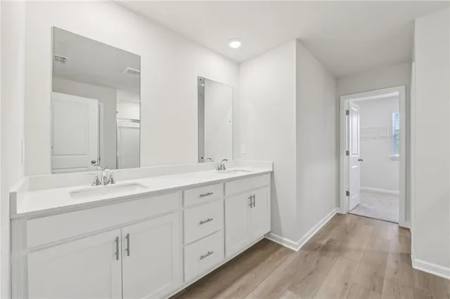 an empty room with wooden floor