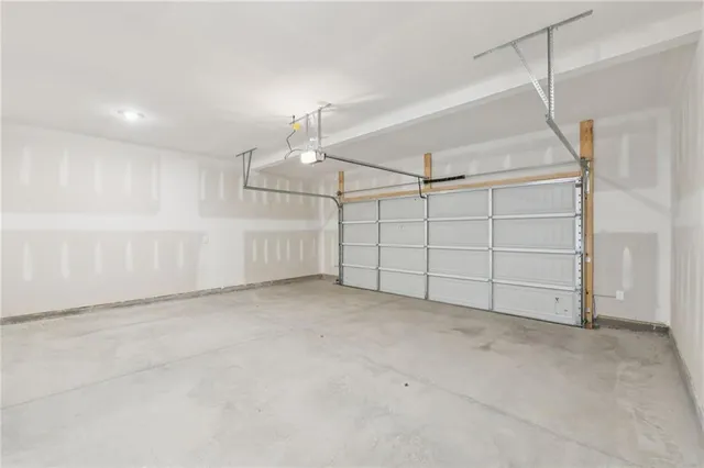 a view of a porch with a big yard and potted plants