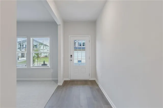 an empty room with windows