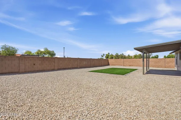 a backyard of a house with a yard