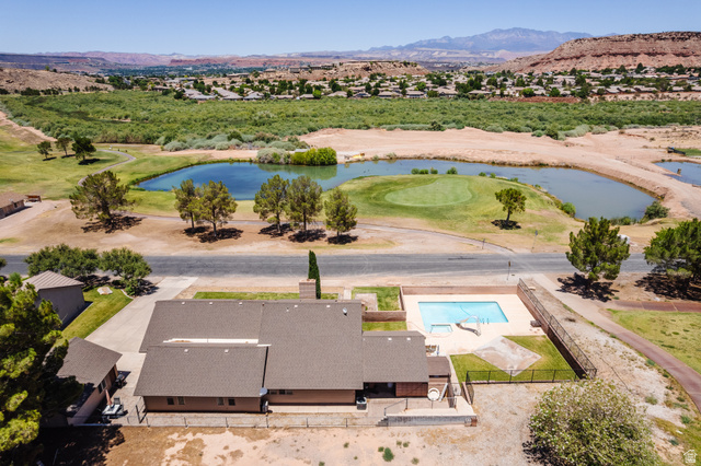 1470 Redwood Tree Street St. George, UT 84790 - Photo 42 of 53 Residential property featuring a private swimming pool, fenced backyard, and a detached structure