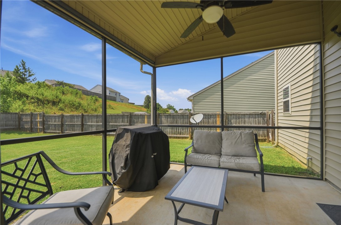 347 Riverdale Road Simpsonville, SC 29680 - Photo 22 of 30 Enjoy outdoor living and expansive views from this screened-in patio, perfect for relaxation.