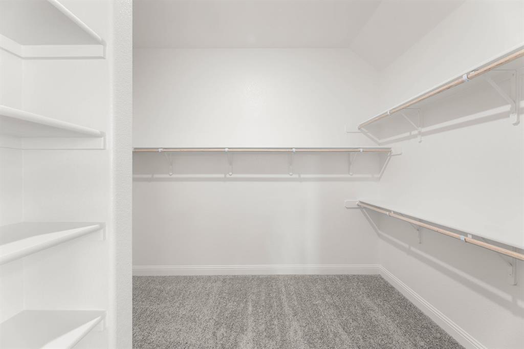 713 Seahawk Street Joshua, TX 76058 - Photo 16 of 31 a view of an empty walk in closet