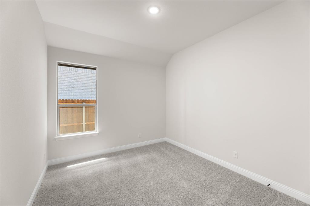 713 Seahawk Street Joshua, TX 76058 - Photo 18 of 31 an empty room with a window