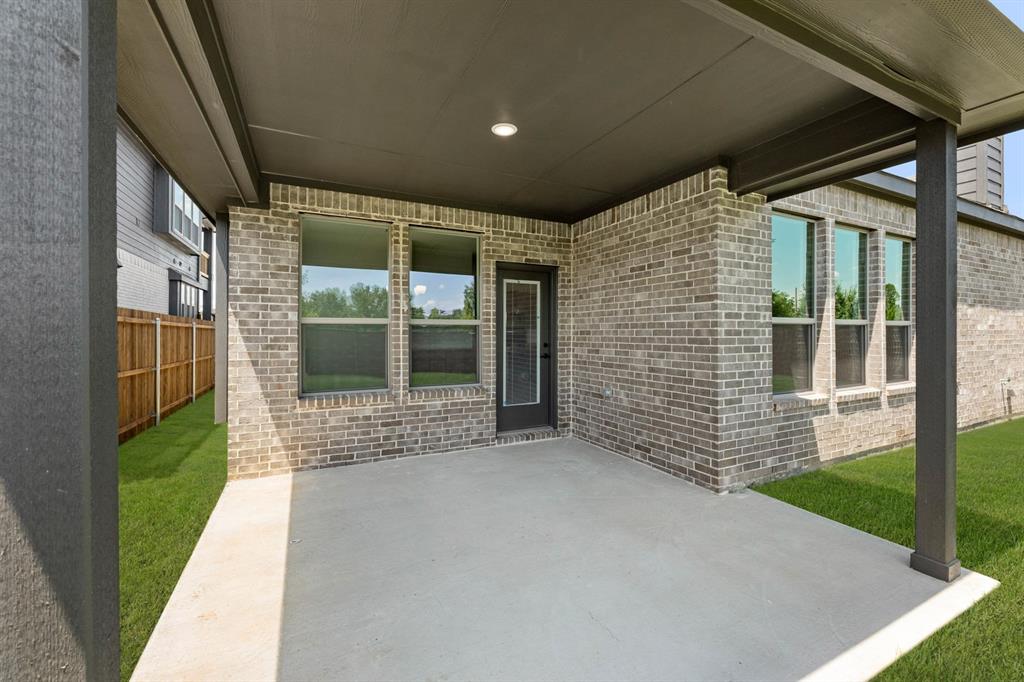 713 Seahawk Street Joshua, TX 76058 - Photo 24 of 31 a porch with seating space