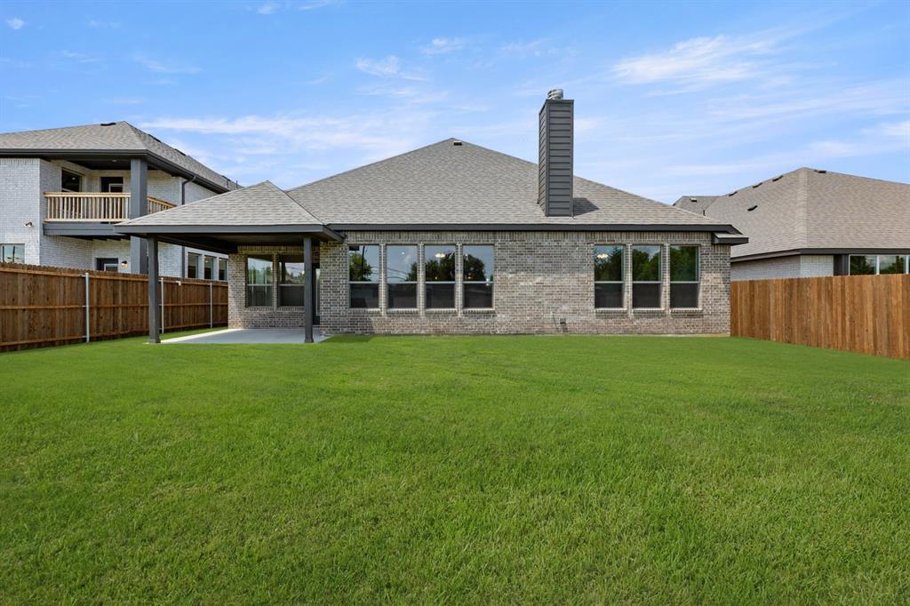 713 Seahawk Street Joshua, TX 76058 - Photo 26 of 31 front view of a house with a yard