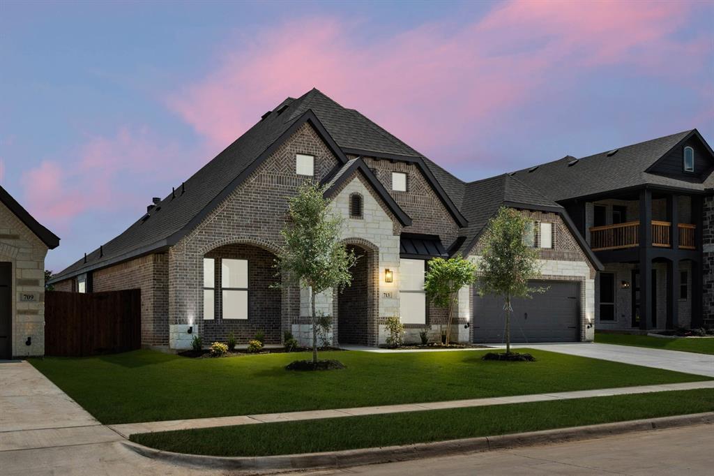 713 Seahawk Street Joshua, TX 76058 - Photo 30 of 31 a front view of a house with a yard