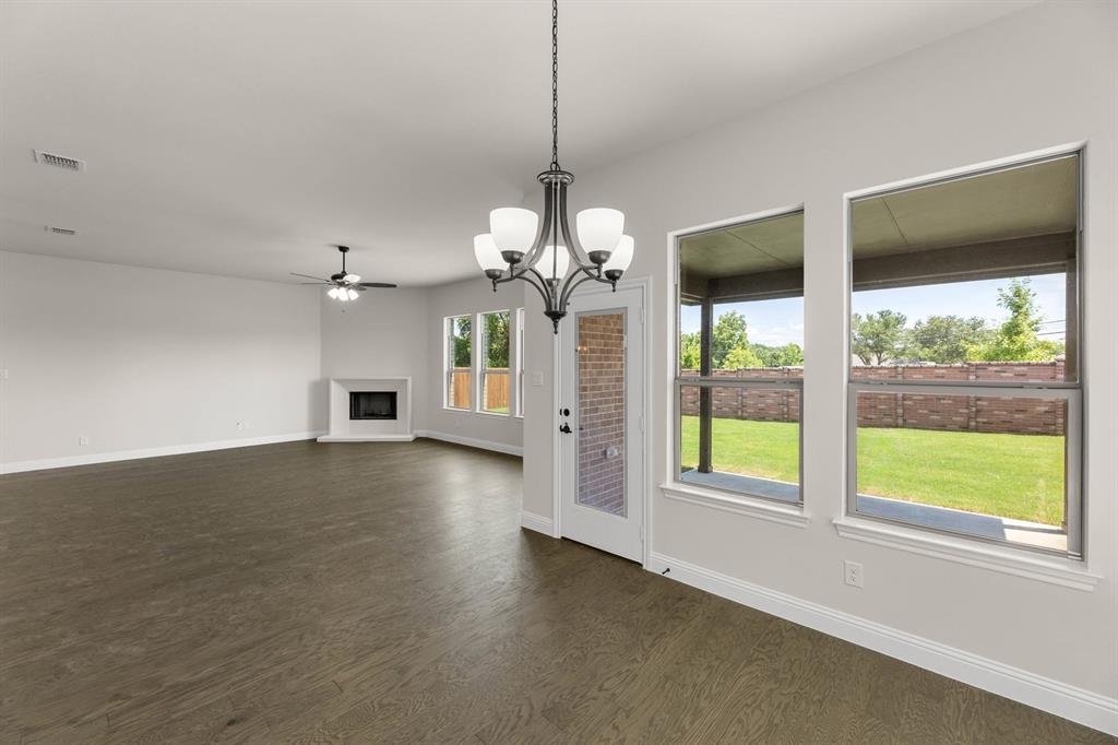 713 Seahawk Street Joshua, TX 76058 - Photo 8 of 31 a view of a room with window and cabinet