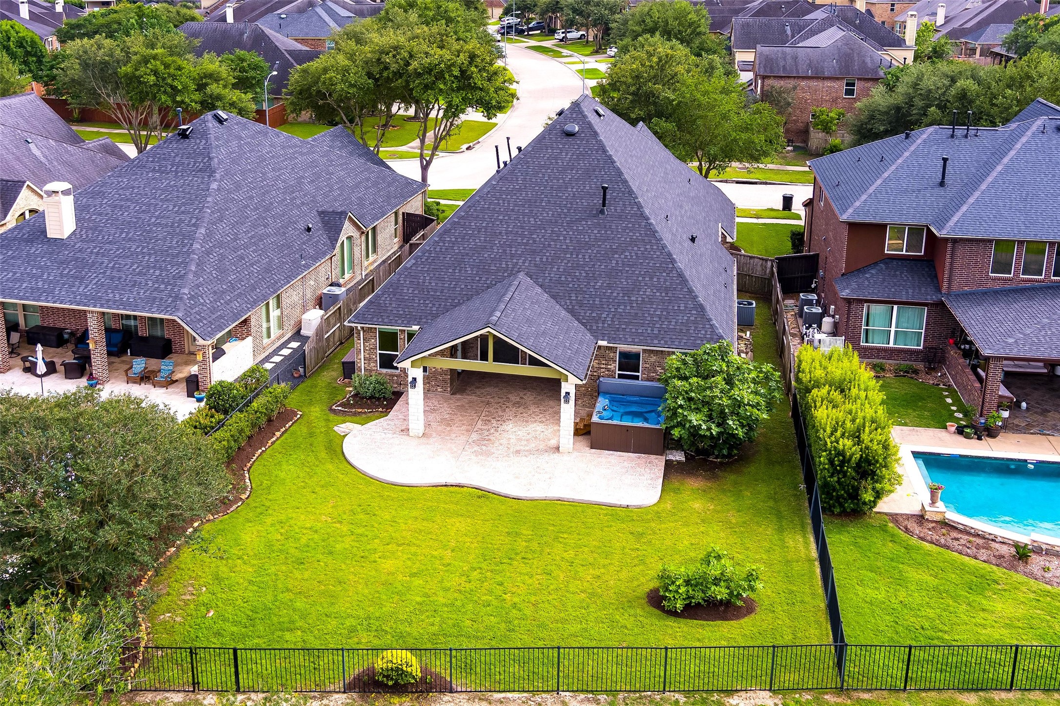 27714 Linden Ridge Lane Fulshear, TX 77441 - Photo 2 of 48 With no rear neighbors, enjoy the serenity of the texas sized patio. New roof in 2025!