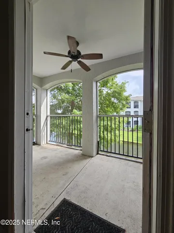a view of a balcony with an outdoor space