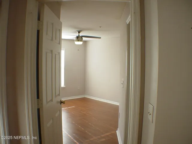 a view of a room with racks on the wall