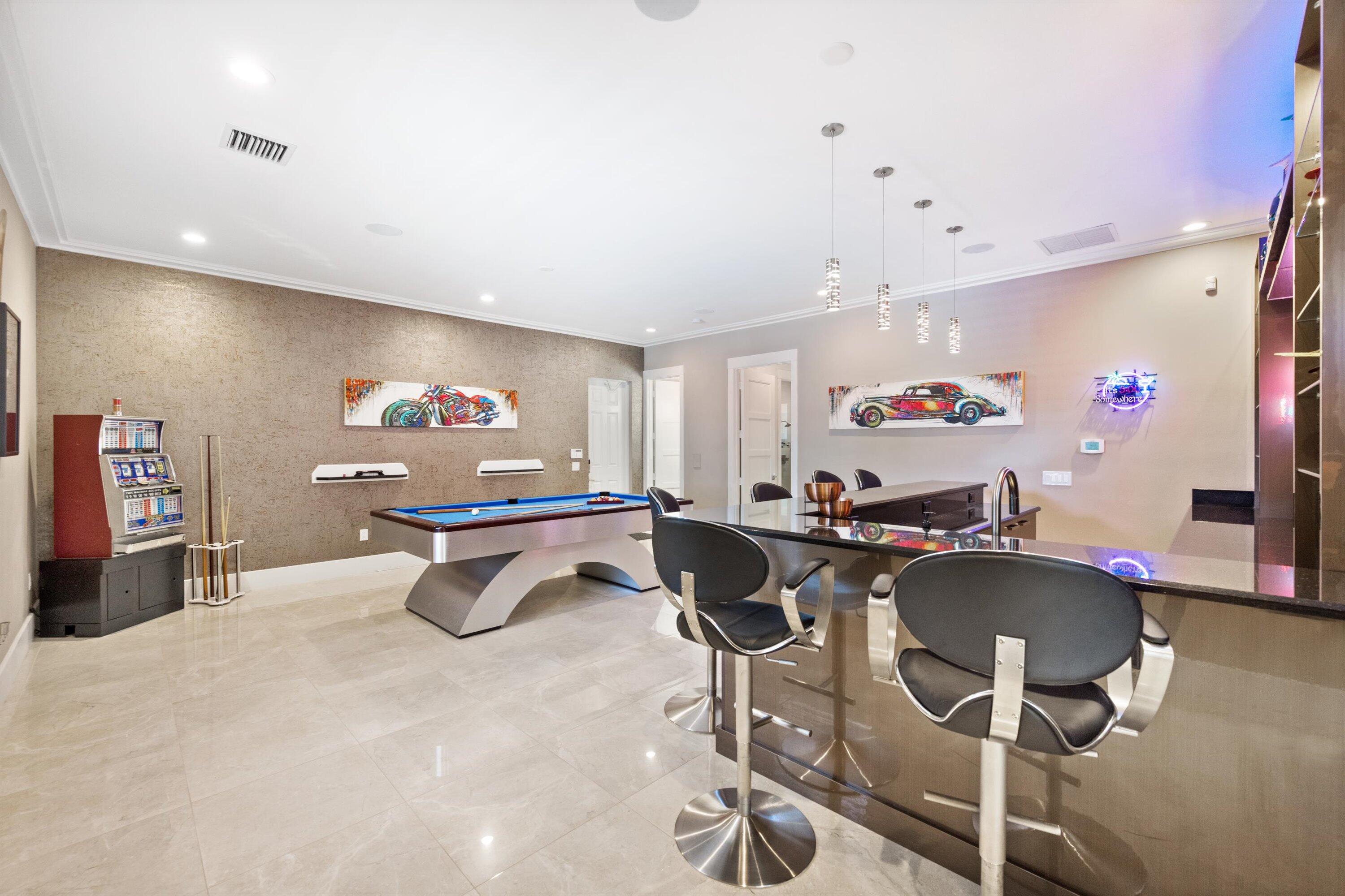 15880 Barnstormer Court Wellington, FL 33414 - Photo 19 of 48 a living room with furniture and a table