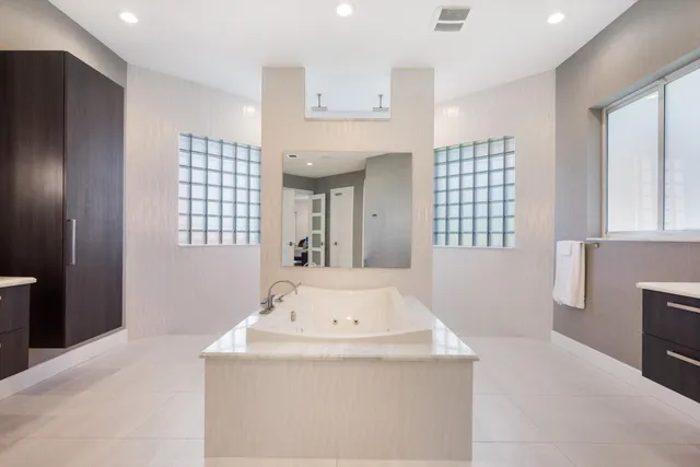 a view of living room with granite countertop furniture and window