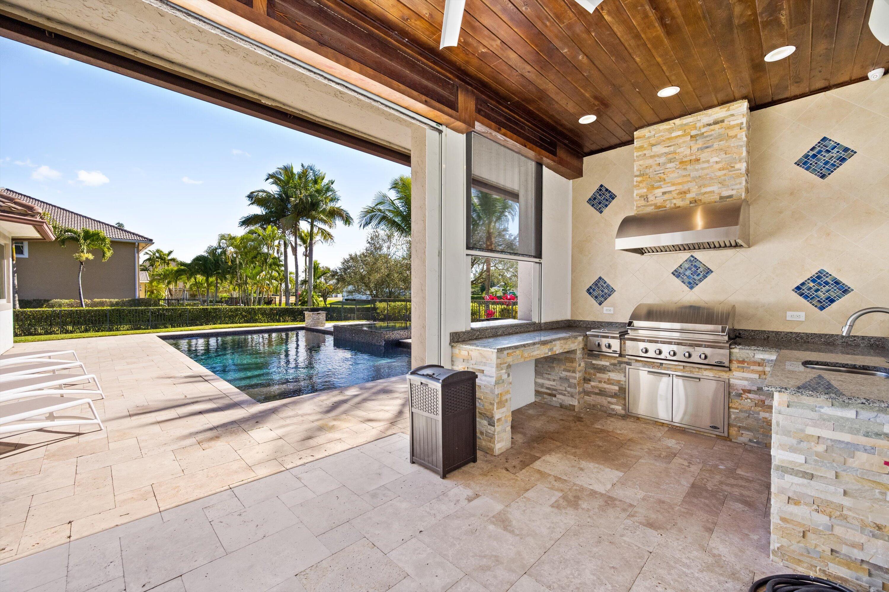 15880 Barnstormer Court Wellington, FL 33414 - Photo 41 of 48 a lobby with furniture and floor to ceiling window