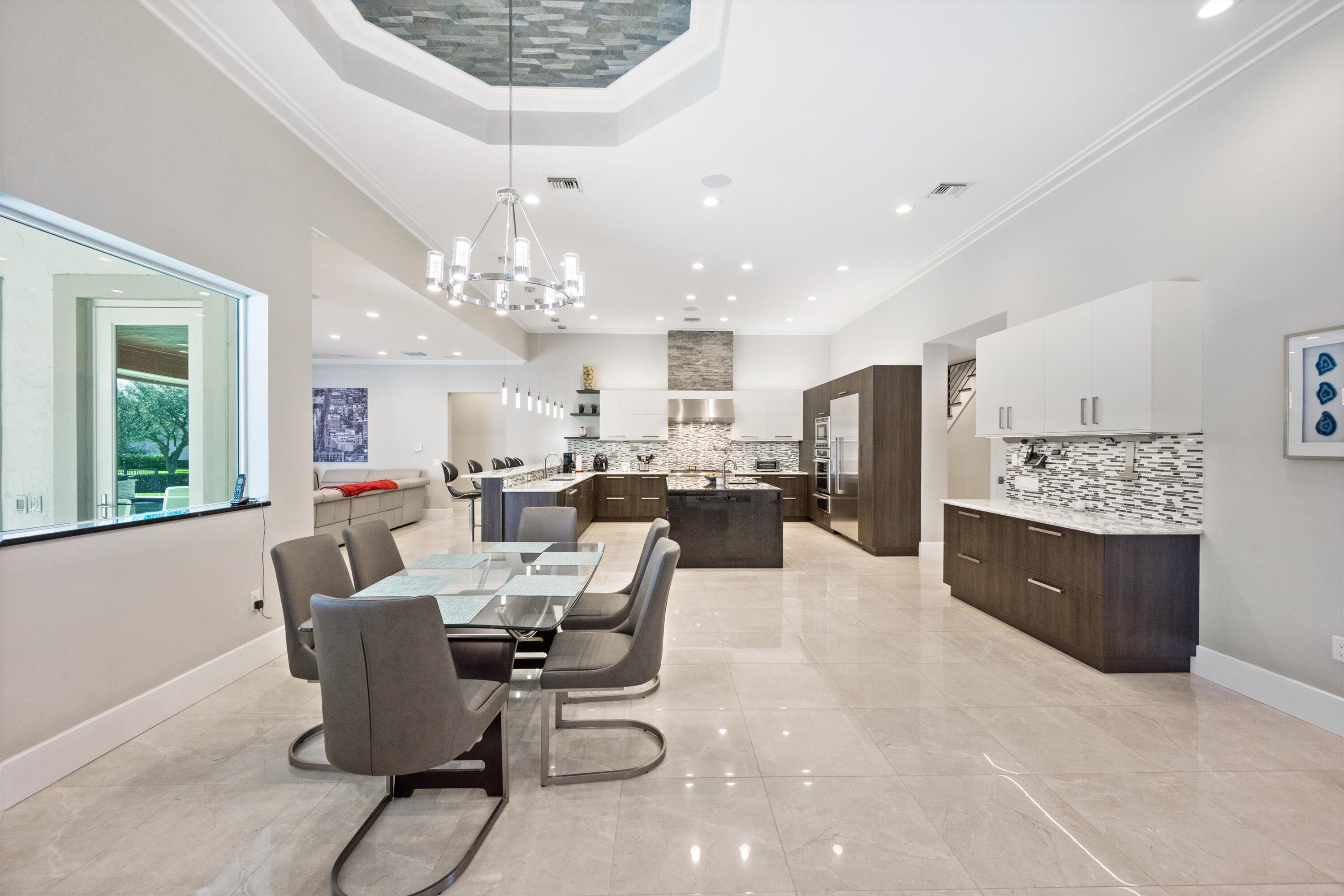 15880 Barnstormer Court Wellington, FL 33414 - Photo 8 of 48 a view of a dining room with furniture window and outside view