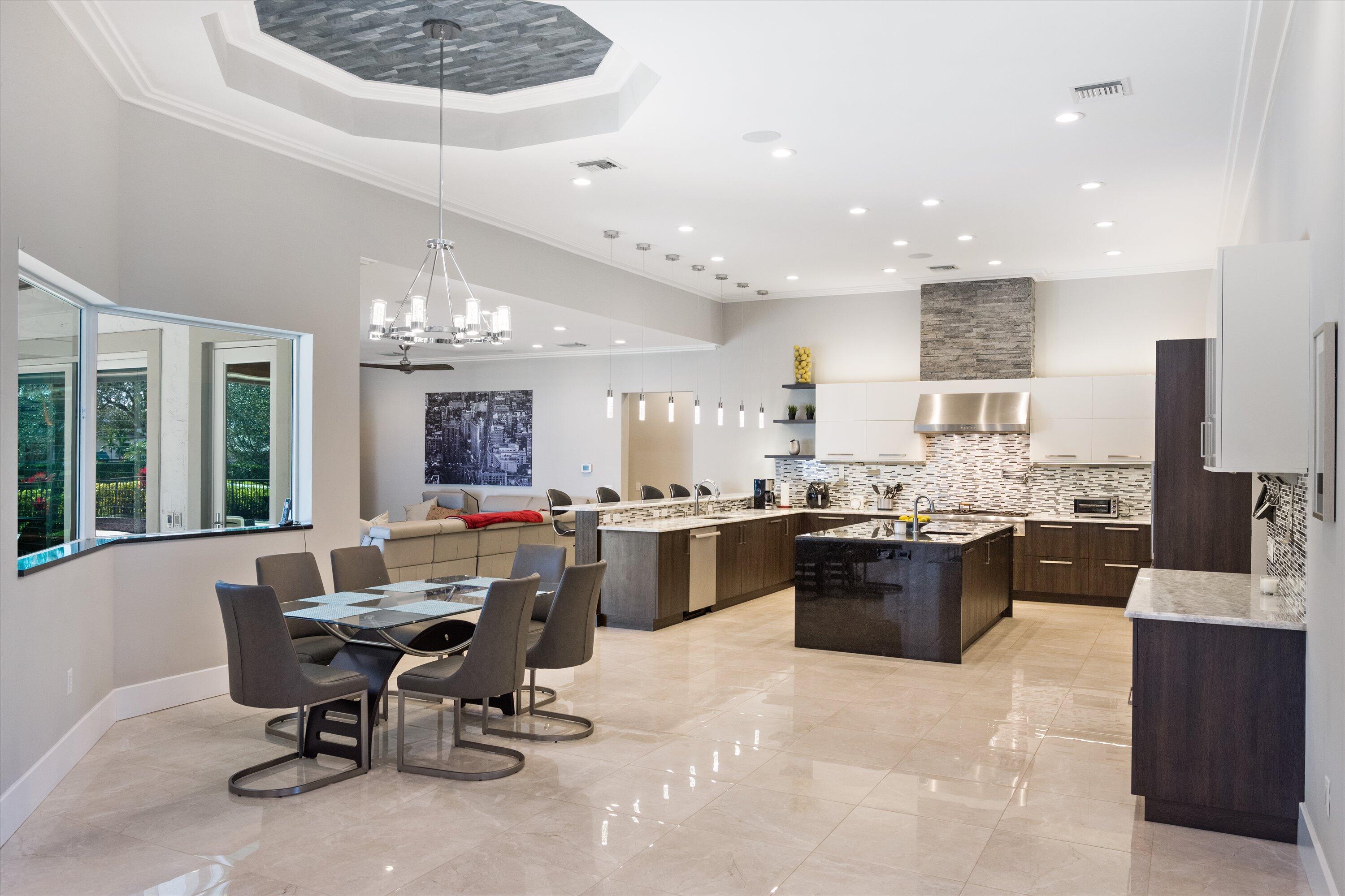15880 Barnstormer Court Wellington, FL 33414 - Photo 9 of 48 a view of a dining room with furniture
