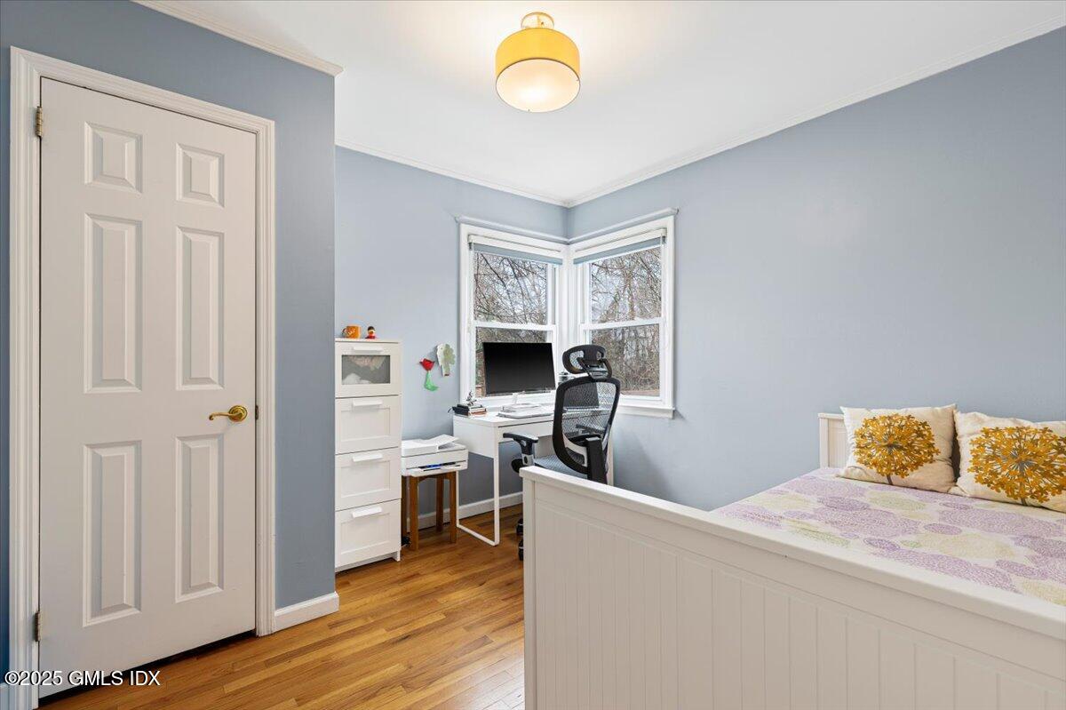 12 Mary Lane Riverside, CT 06878 - Photo 12 of 26 a view of a room with wooden floor and cabinet