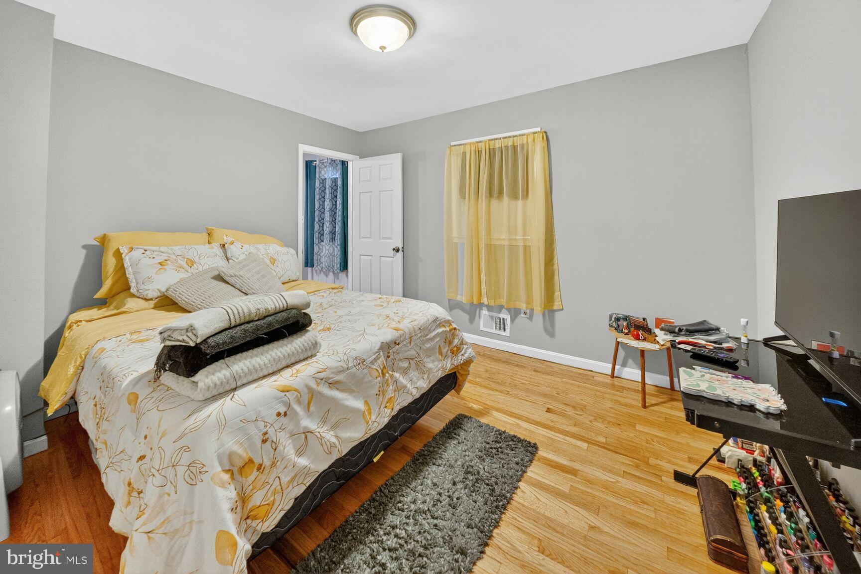 6117 Osborn Road Landover, MD 20785 - Photo 11 of 18 Cozy bedroom with warm, inviting tones.