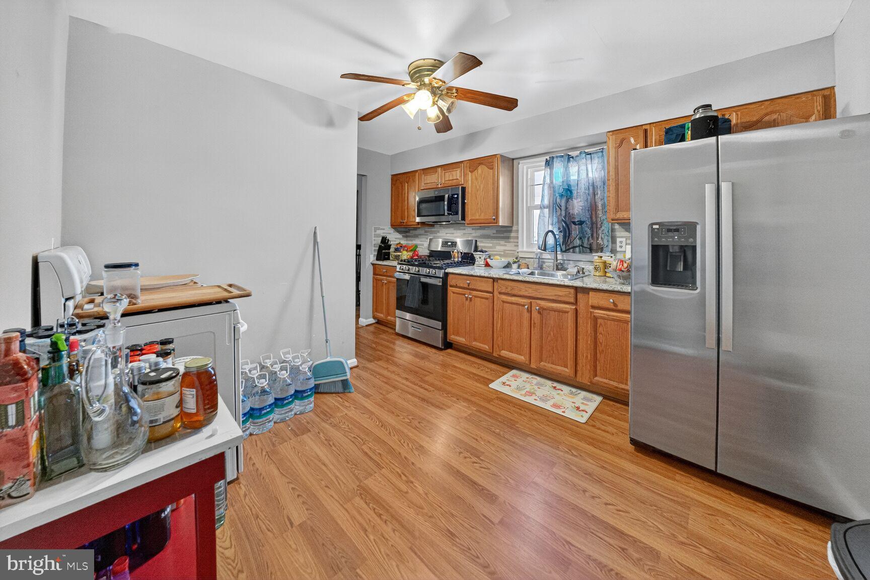 6117 Osborn Road Landover, MD 20785 - Photo 8 of 18 Bright and inviting kitchen with modern charm.
