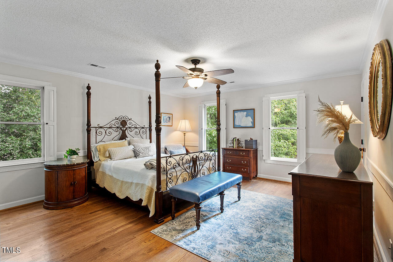 2408 Heartley Drive Raleigh, NC 27615 - Photo 27 of 41 a living room with furniture and a large window