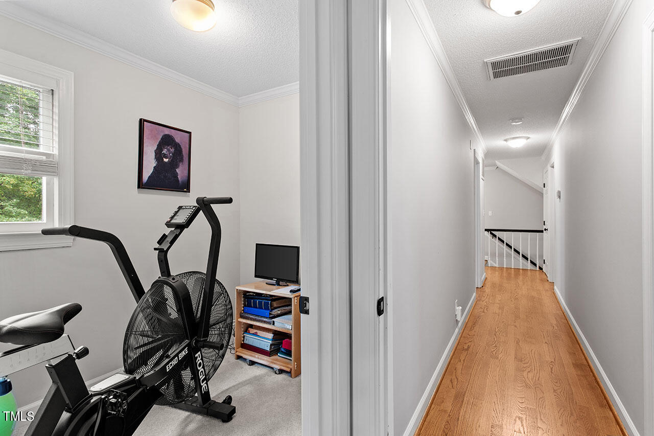 2408 Heartley Drive Raleigh, NC 27615 - Photo 36 of 41 a view of a room with gym equipment