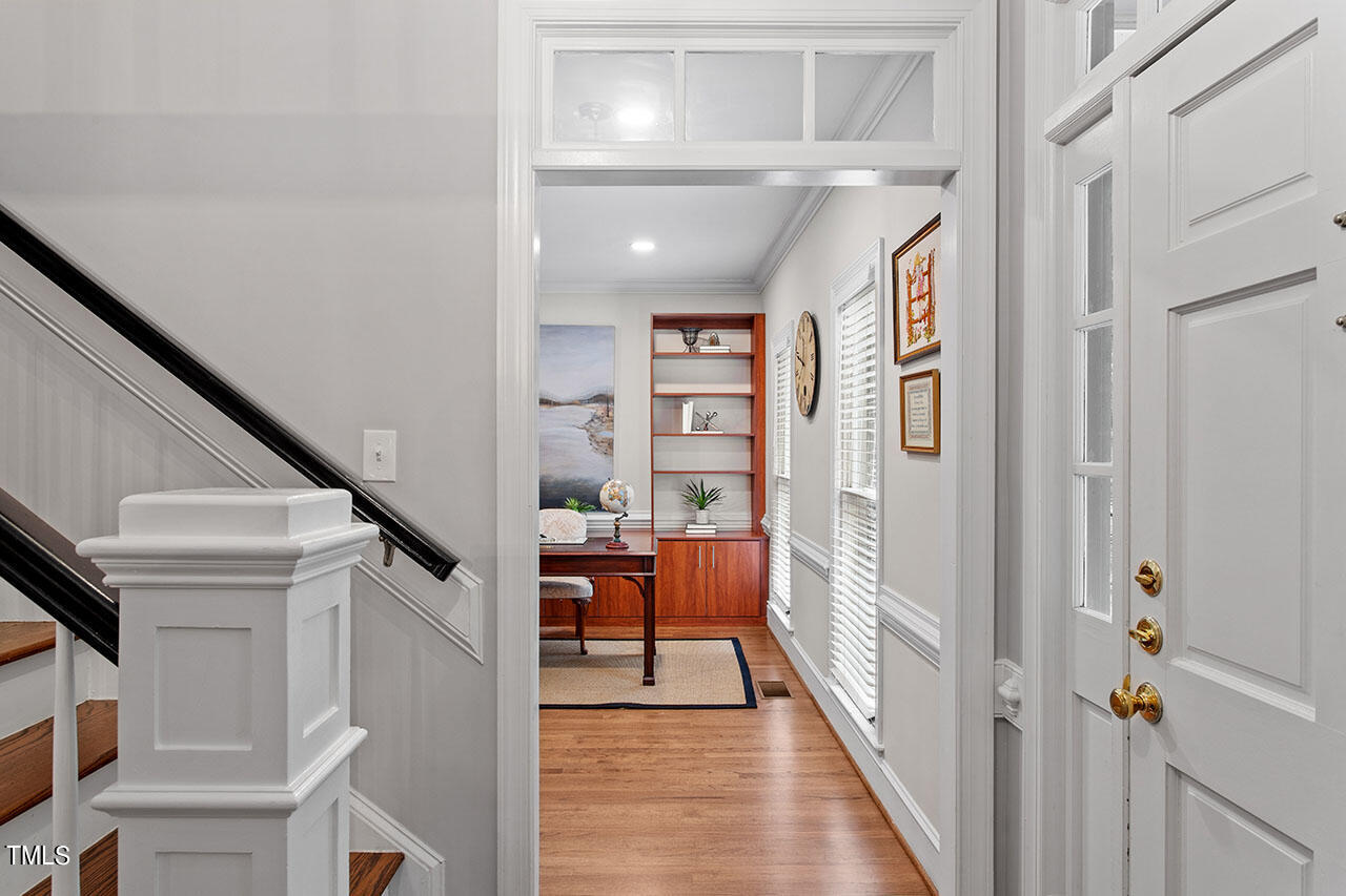 2408 Heartley Drive Raleigh, NC 27615 - Photo 5 of 41 a view of a hallway with entryway and furniture