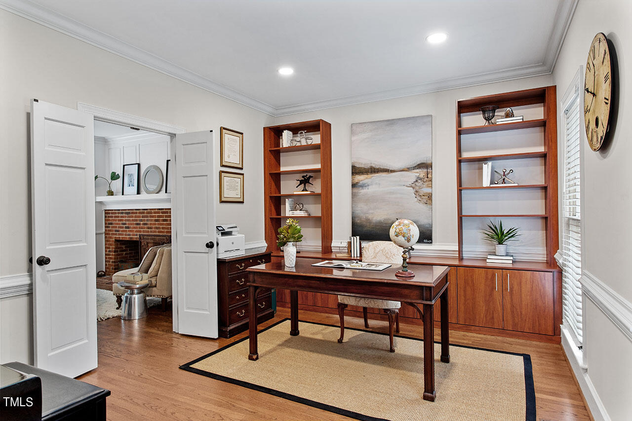 2408 Heartley Drive Raleigh, NC 27615 - Photo 6 of 41 a workspace with furniture and window