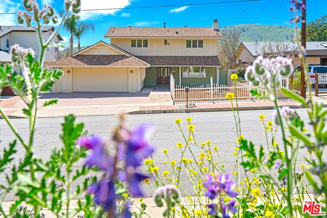 a front view of a multi story residential apartment building
