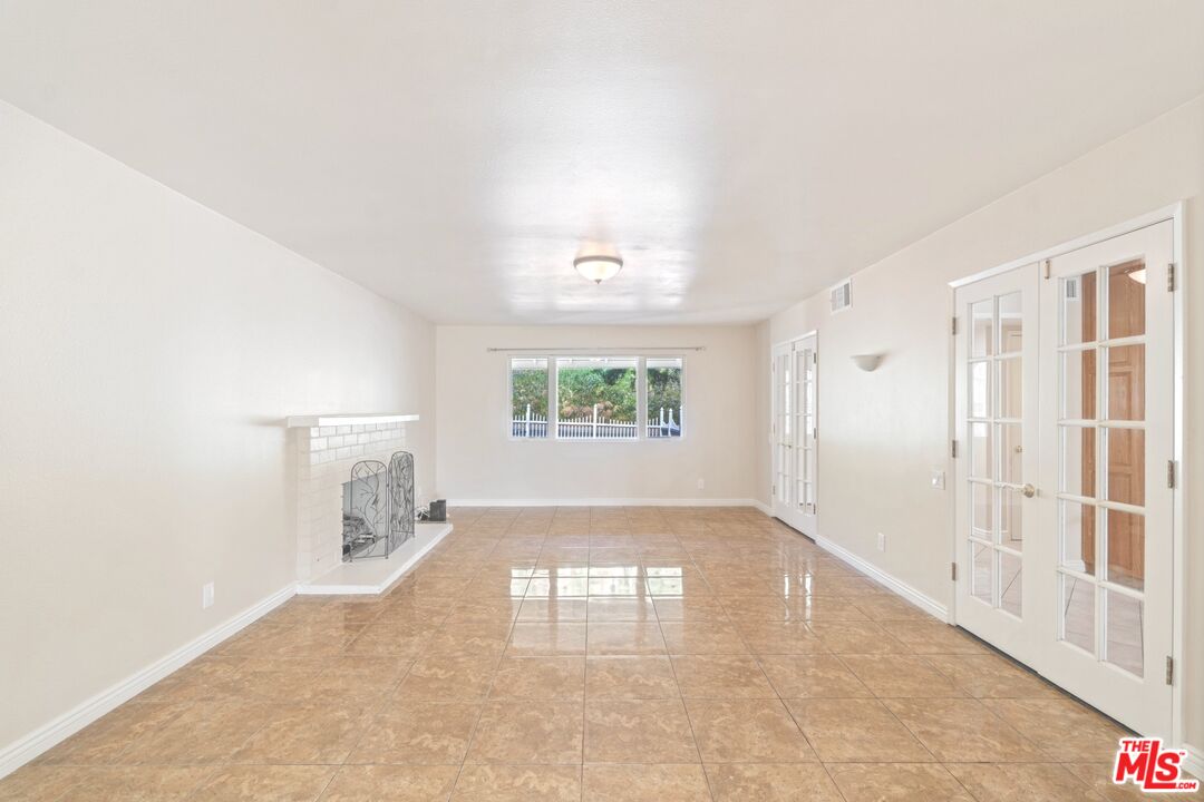 5703 Parkmor Road Calabasas, CA 91302 - Photo 11 of 29 a view of empty room with front door