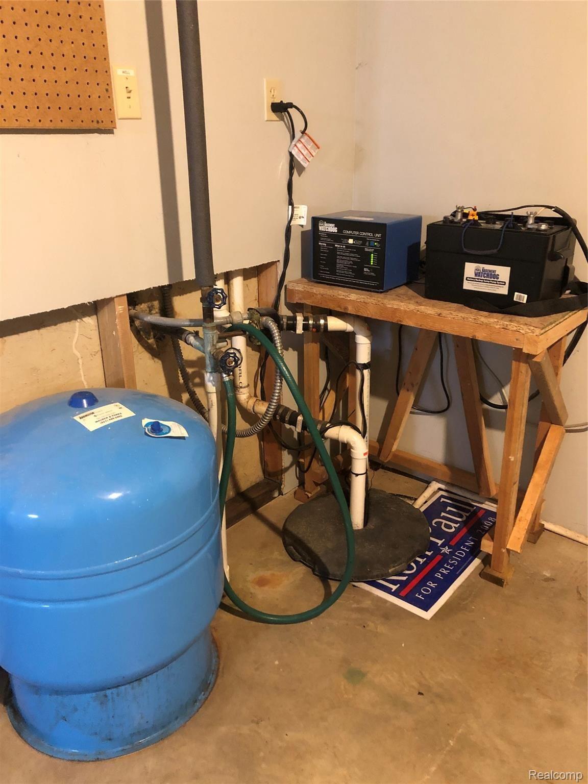 3779 South Bull Run Road Gregory, MI 48137 - Photo 21 of 35 Well tank, sump pump with backup, runs with heavy rains only.