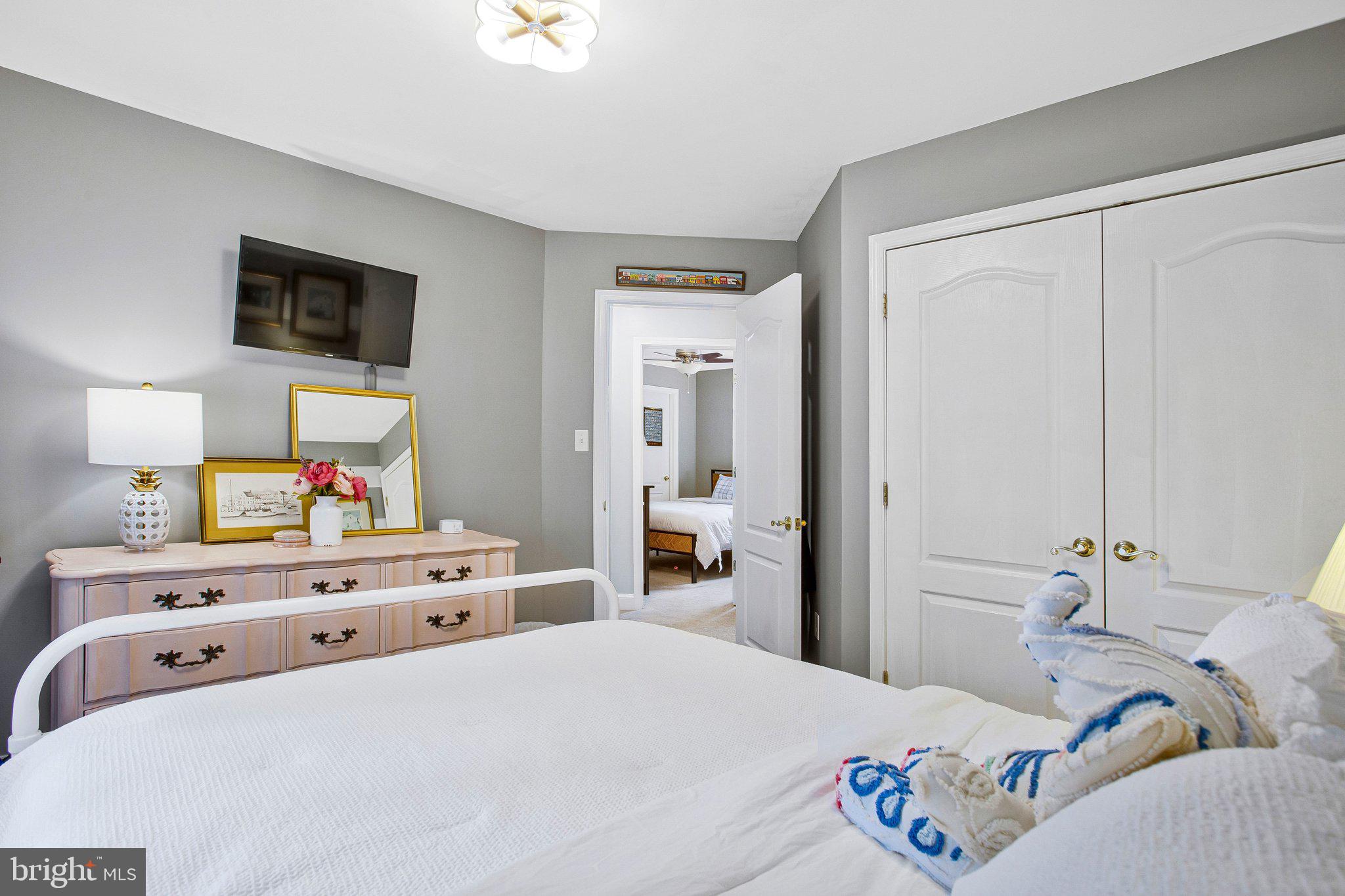 1582 Snug Harbor Road Shady Side, MD 20764 - Photo 34 of 53 Serene bedroom with modern charm.