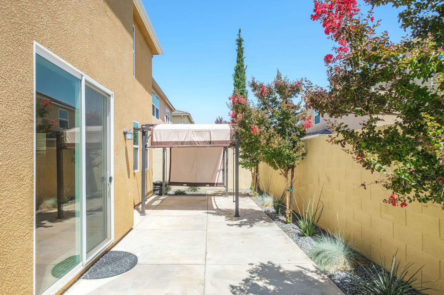 3482 Elevations Way Clovis, CA 93619 - Photo 25 of 29 a view of a house with a backyard