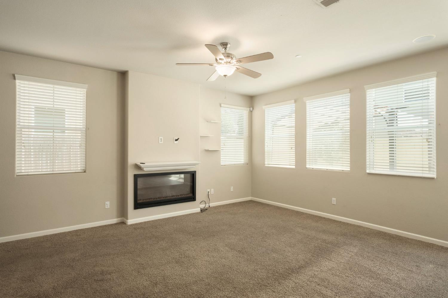 3482 Elevations Way Clovis, CA 93619 - Photo 8 of 29 a view of an empty room with a window