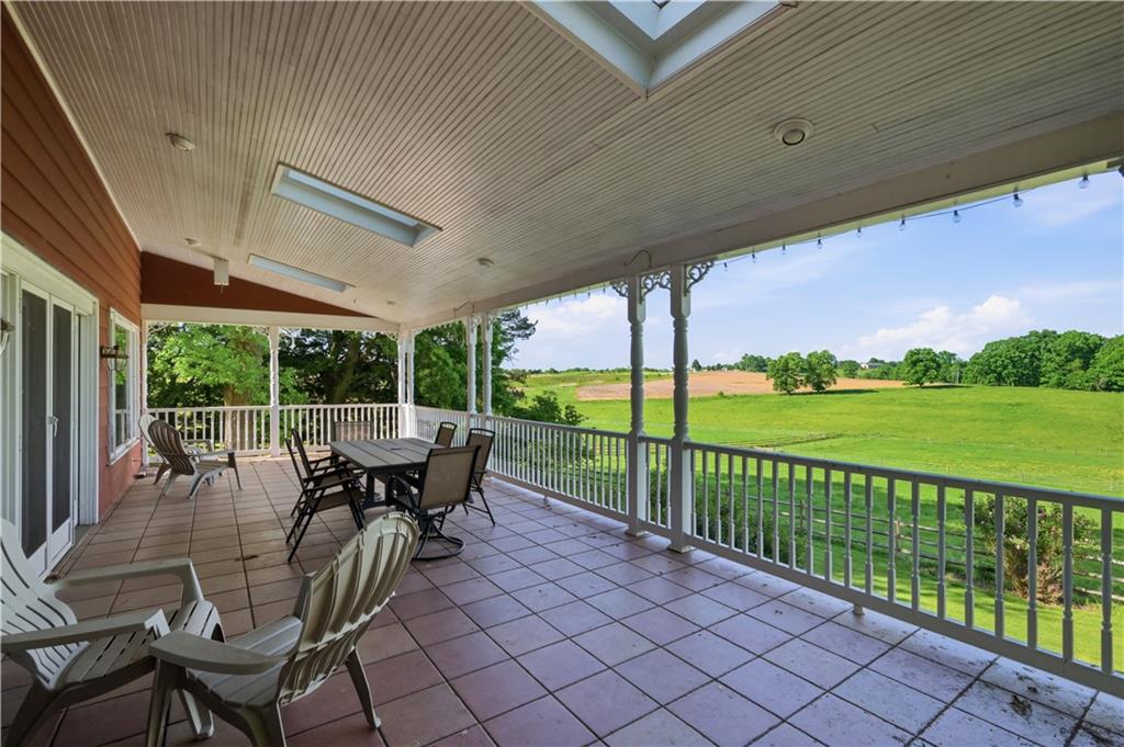 121 Brewer Road Saxonburg, PA 16056 - Photo 2 of 49 a view of a patio with a table chairs and backyard