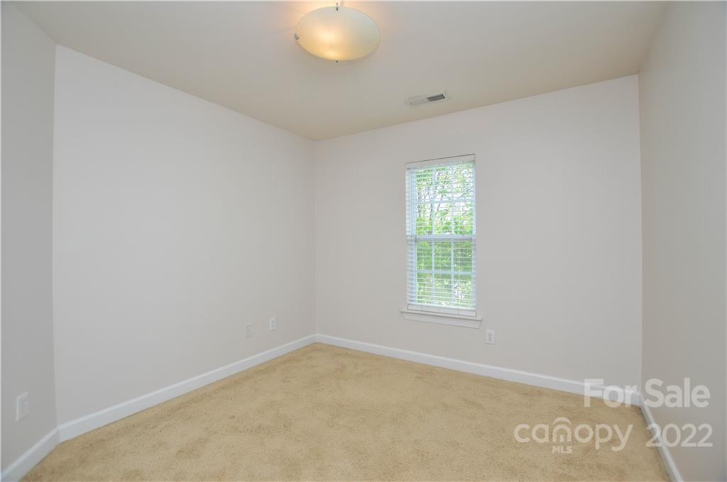 12110 Red Rust Lane Charlotte, NC 28277 - Photo 21 of 36 an empty room with windows