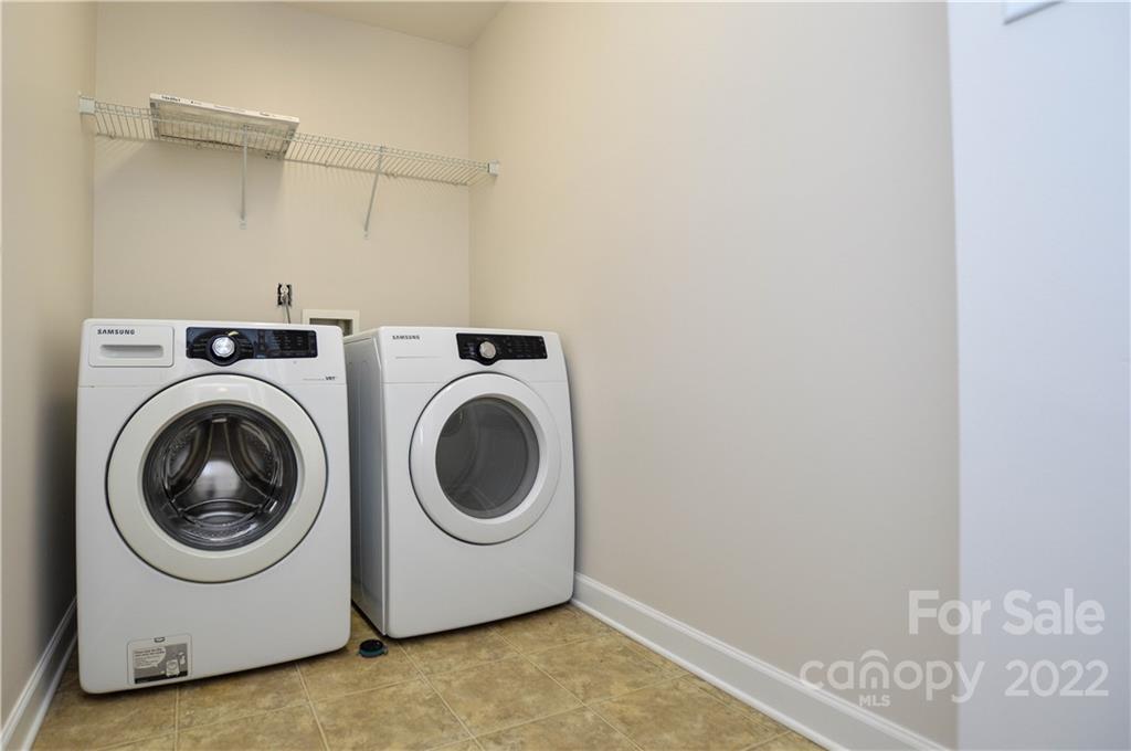 12110 Red Rust Lane Charlotte, NC 28277 - Photo 26 of 36 a utility room with dryer and washer