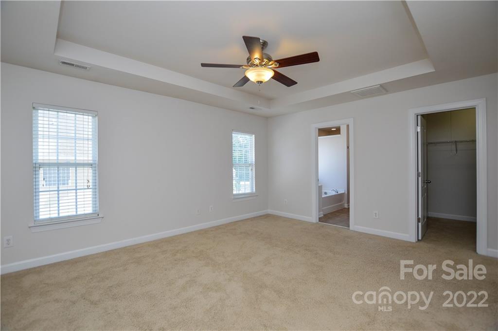 12110 Red Rust Lane Charlotte, NC 28277 - Photo 28 of 36 a view of an empty room with a window