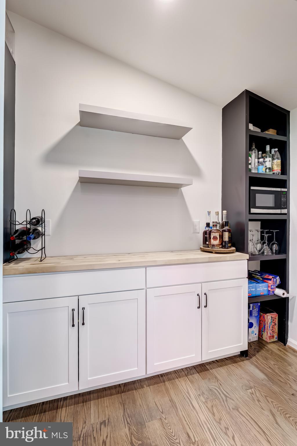 11926 Appling Valley Road Fairfax, VA 22030 - Photo 29 of 60 a kitchen with white cabinets