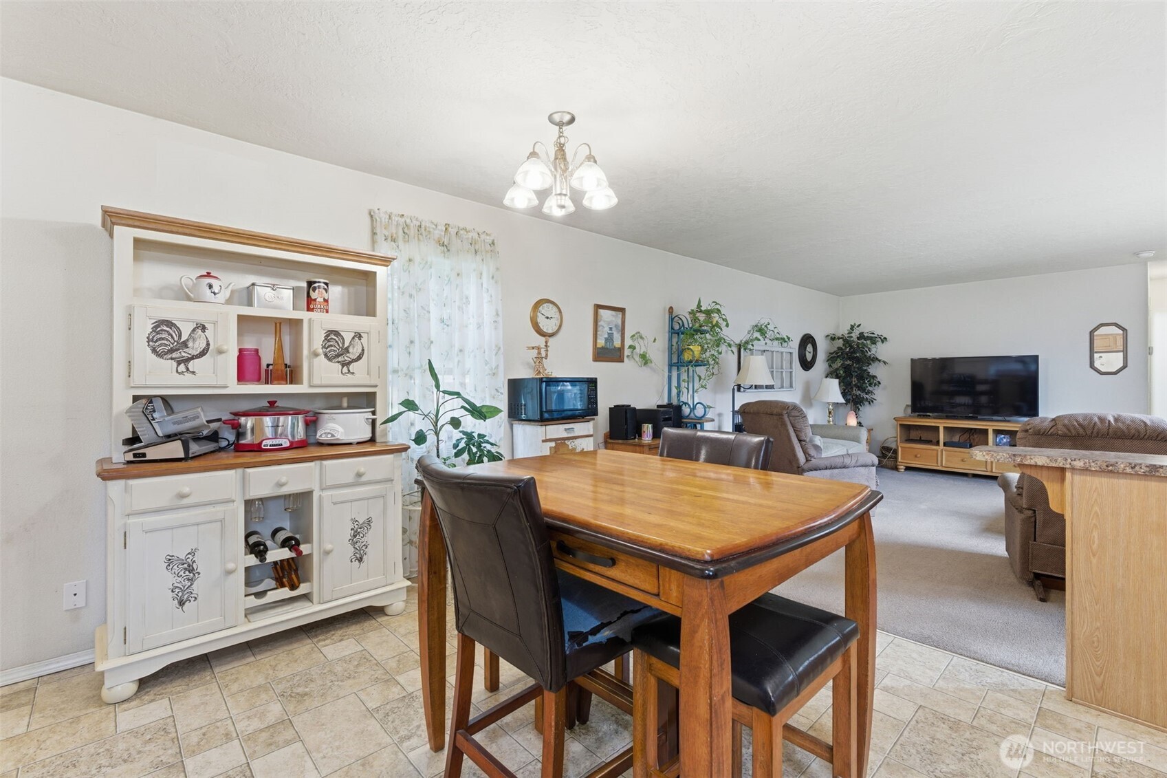 19141 Joselyn Road Southwest Rochester, WA 98579 - Photo 11 of 27 a view of a dining room with furniture