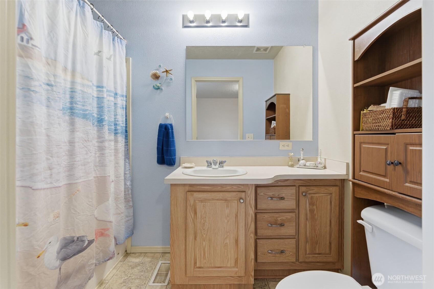 19141 Joselyn Road Southwest Rochester, WA 98579 - Photo 15 of 27 a bathroom with a sink a toilet and shower