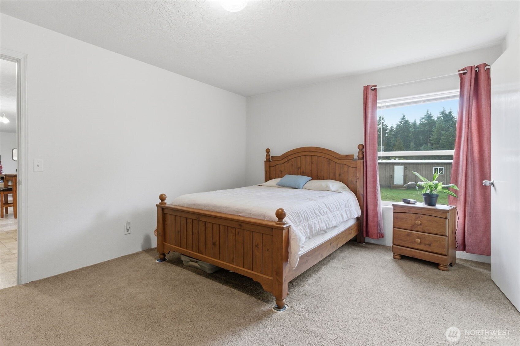 19141 Joselyn Road Southwest Rochester, WA 98579 - Photo 17 of 27 a bed sitting in a room and window