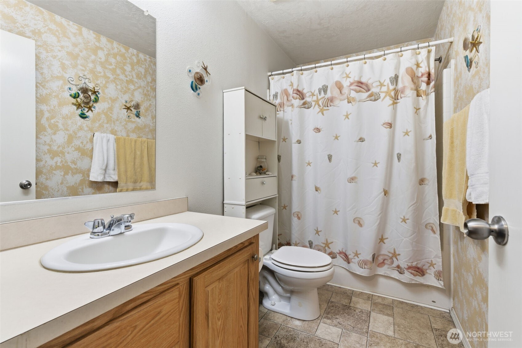 19141 Joselyn Road Southwest Rochester, WA 98579 - Photo 18 of 27 a bathroom with a sink toilet and shower