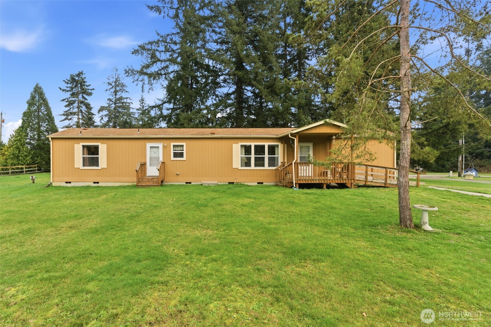 19141 Joselyn Road Southwest Rochester, WA 98579 - Photo 24 of 27 a view of a house with backyard and garden