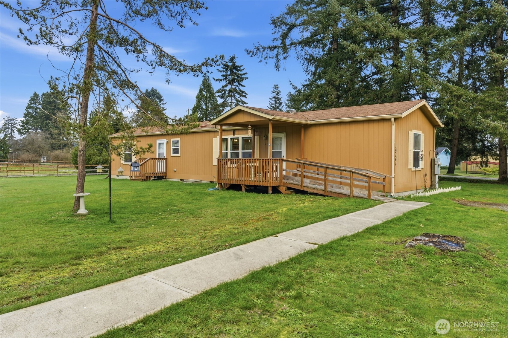 19141 Joselyn Road Southwest Rochester, WA 98579 - Photo 25 of 27 a front view of a house with a garden