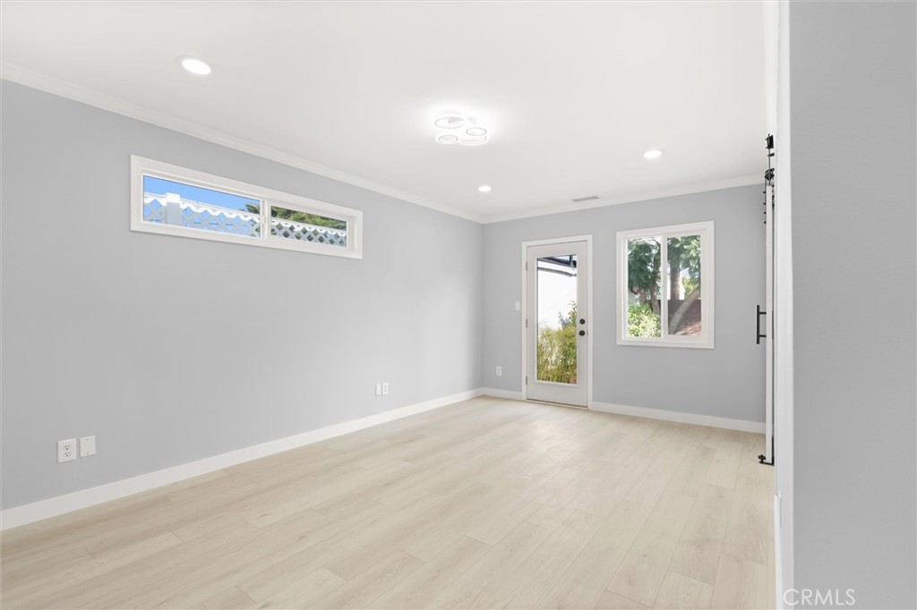 8460 Truxton Avenue Los Angeles, CA 90045 - Photo 21 of 41 an empty room with windows