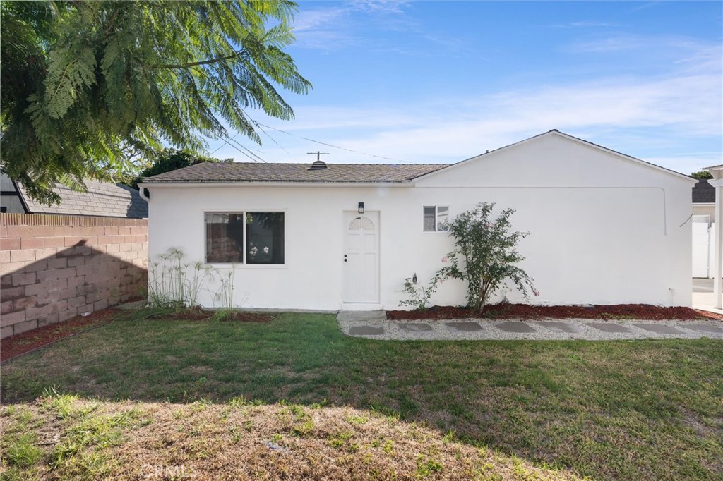 8460 Truxton Avenue Los Angeles, CA 90045 - Photo 35 of 41 a front view of a house with a yard