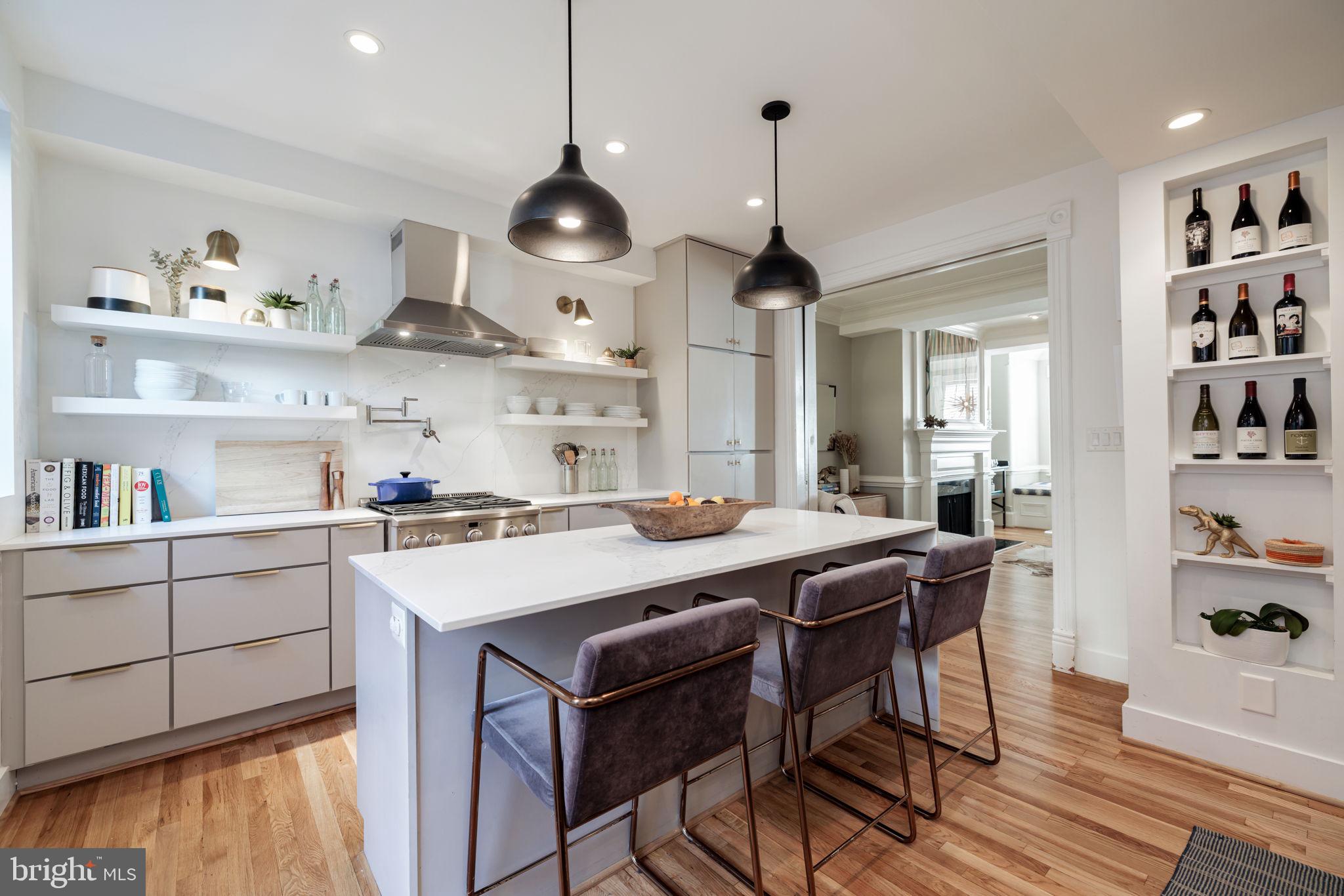 205 3rd Street Northeast Washington, DC 20002 - Photo 8 of 26 Open kitchen with island seating